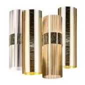 Gold la lollo wall lamps, brushed metallic finish, cylindrical shape with ridged texture and dark gray band, studio product shot.