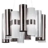 Pewter suspension lamp with layered cylindrical shades, brushed metal finish, and intersecting geometric forms against a white backdrop.