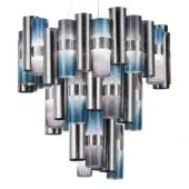Modern chandelier with gradient blue, gray, and lavender cylindrical elements suspended on thin wires, featuring a brushed metallic texture.