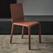 Elegant Bontempi Alice chair upholstered in reddish-brown hide leather with sleek linearity and expertly crafted stitching