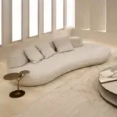Superior Rugiano Rafael sofa with beautifully curved form upholstered in matte beige fabric and built-in marble detail
