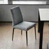 Elegant Bontempi Mila chair upholstered in black and white houndstooth textile with matte-finish metal legs