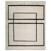 Rectangular Rugiano “collective rug white” with geometric black lines on a beige textured field, featuring overlapping rectangles and raw edges.