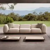 Exclusive Rugiano Amalfi sofa with stained mahogany, chrome details, and light beige outdoor fabric upholstery
