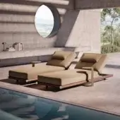 Distinguished Rugiano Amalfi sunbed with a plush fabric cushion and beautifully stained mahogany wood frame with chrome details and satin sheen