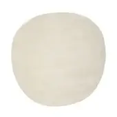 Circular rug, off-white wool, organic shape with uneven edges and dense pile, minimalist design in studio lighting.