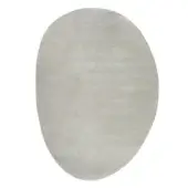 Ciclopi pietra ghiaccio rug, muted gray, organic shape with textured pile against a white backdrop.
