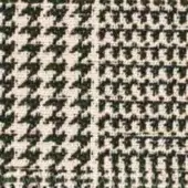Houndstooth fabric, olive green and beige, dense weave with visible threads and angular pattern; textile sample labeled “egoitaliano basquiat”.