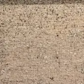 Beige woven fabric texture with vertical ribbing, mottled tones, and dark flecks; tight, coarse weave with oily sheen, labeled “egoitaliano.”