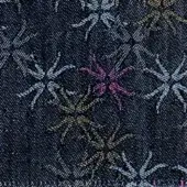 Navy denim fabric with repeating floral pattern in light blue, gold, and purple, featuring radiating lines and woven texture.