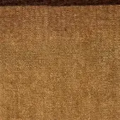 Microfiber fabric texture in golden-brown, displaying a dense, matte weave with a granular surface and subtle speckled pattern; labeled “egoitaliano”.