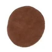 Rugiano ciclopi isola rug terra, circular brown rug with dense pile and subtly irregular edge against a white background.