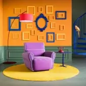 Distinguished Egoitaliano Mariù lounge chair with vibrant purple two-way stretch fabric upholstery and enveloping cushioning built with a wood frame