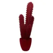Artificial cactus, burgundy color, two upright stalks with textured protrusions in a rounded matte pot against a white backdrop.