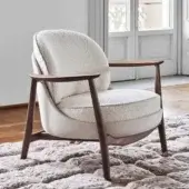 Distinguished Porada Ginkgo XL lounge chair with Canaletta walnut frame and textured off-white bouclé-like textile upholstery