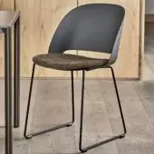 Elegant Bontempi Polo chair with dark gray shell and mottled brown beige seat cushion built with a black metal sled base