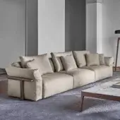 Exceptional Porada Ronny sofa crafted with multilayer wood, poplar, and fir, upholstered in textured neutral beige textile with satin-finish wooden armrests