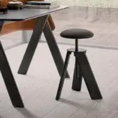 Distinguished Presotto Squid stool with fabric upholstery and sleek black metal base exhibiting a matte finish