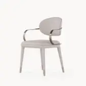 Elegant Visionnaire Elixir armchair with curved matte beige leather upholstery and polished satin twisted metal support