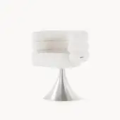 Distinctive Visionnaire Voluptas armchair with textured light cream textile and polished stainless steel base offering adjustable height