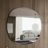 Distinctive Dallagnese Radius mirror crafted in precision glass with a polished-edge finish and subtly asymmetrical form