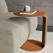 Distinguished Dallagnese Beam side table in reddish-brown regenerated hard leather with tailored stitching and a curved metal frame