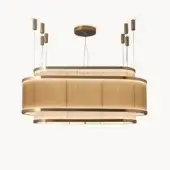 Elegant Visionnaire Giano suspension lamp in layered oval form with satin steel and PVD gold finished borosilicate glass tubes