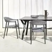 Sophisticated Varaschin Clever armchair with aluminum frame and VAR#TEX fabric upholstery in a subtle gray and white pattern