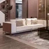Distinctive Visionnaire Backstage sofa with light beige textile upholstery and woven wood paneling built on a satin steel frame