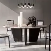 Distinguished Giorgetti Mistral round table with a marble top divided by a bronze insert and veneered ash wood legs