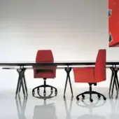 Distinguished OAK Kronos table with a dark glossy wooden surface, crystal glass insert and bronzed brass metal legs