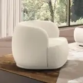 Exceptional CTS Salotti Navona lounge chair with gently curved fully upholstered form and matte finish textile upholstery