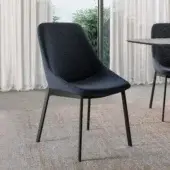 Distinctive Dallagnese Le Mans chair with dark gray-blue quilted fabric and a fixed metal frame built with brass reinforcement