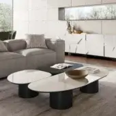 Distinctive Dallagnese Atollo coffee table with organically shaped stoneware and sleek black metal base