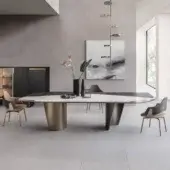 Distinguished Shake Ego table with sculpted plywood legs and a blockboard ash wood tabletop featuring a textured stoneware insert in gray-white and bronze