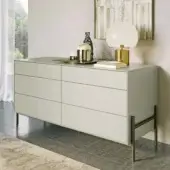Exceptional Dallagnese Supernova dresser with linear drawers and a matte sage green finish built with painted metal and brass tone base