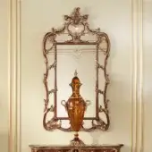 Distinguished Modenese Rubino Delight shaped mirror with reddish-brown and gold wooden frame crafted in Italy