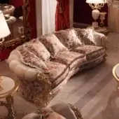 Exquisite Zanaboni Renoir sofa upholstered in cream, red, and green damask fabric with ivory patina gold carvings