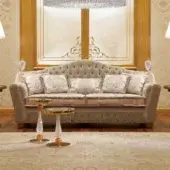 Distinguished Zanaboni Borromeo sofa with wide curved silhouette and plush muted taupe upholstery built with gold leaf legs