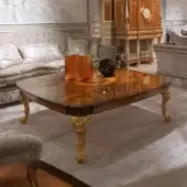 Distinguished Zanaboni T101/C coffee table with marbled wood grain and ornate gold-toned metal detailing crafted with ancient techniques