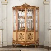 Distinguished Modenese Royal Blend cupboard crafted in walnut wood with golden detailing and inlaid lower panels