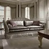 Exquisite Zanaboni Lara sofa with muted gray patterned damask upholstery and gold detailing crafted in solid wood