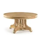 Exquisite Zanaboni T/1925 table crafted in wood with ornate sculpted details and a golden-brown finish