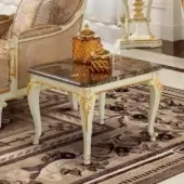 Distinguished Modenese Midnight Moon side table with dark marble tabletop and white hand-carved hardwood legs in satin finish