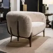 Exceptional Zanaboni Blanca lounge chair with black-stained ash wood frame and creamy off-white long-pile upholstery