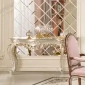 Superior Modenese Noble Etiquette console crafted in Italy with silver leaf and floral motifs reflecting ornate charm