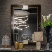 Distinguished Zanaboni SP/15 mirror crafted with ebony wood and brass details, showcasing engraved satin glass inserts