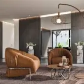 Distinguished Borzalino Sidney armchair with warm brown textured textile and dark satin metal frame