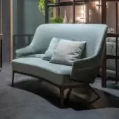 Distinctive Zanaboni Kore sofa crafted in Italy with grayish-blue textile upholstery and a solid wood base