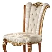 Cream fabric with matching capitonné buttons, cream pleated fabric, cream and gold damask fabric in the seat